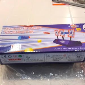 Auto-reset targets. By uwantme. NWOT.